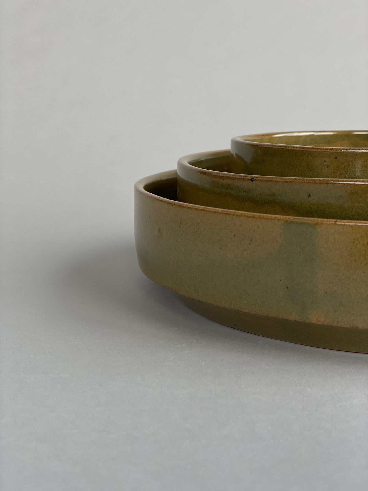 Close-up of a nested ceramic bowsl by Richard Beauchamp, showcasing its simple, modern form.