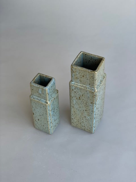 Two column vases by Misma Anaru in an estruscan blue glaze