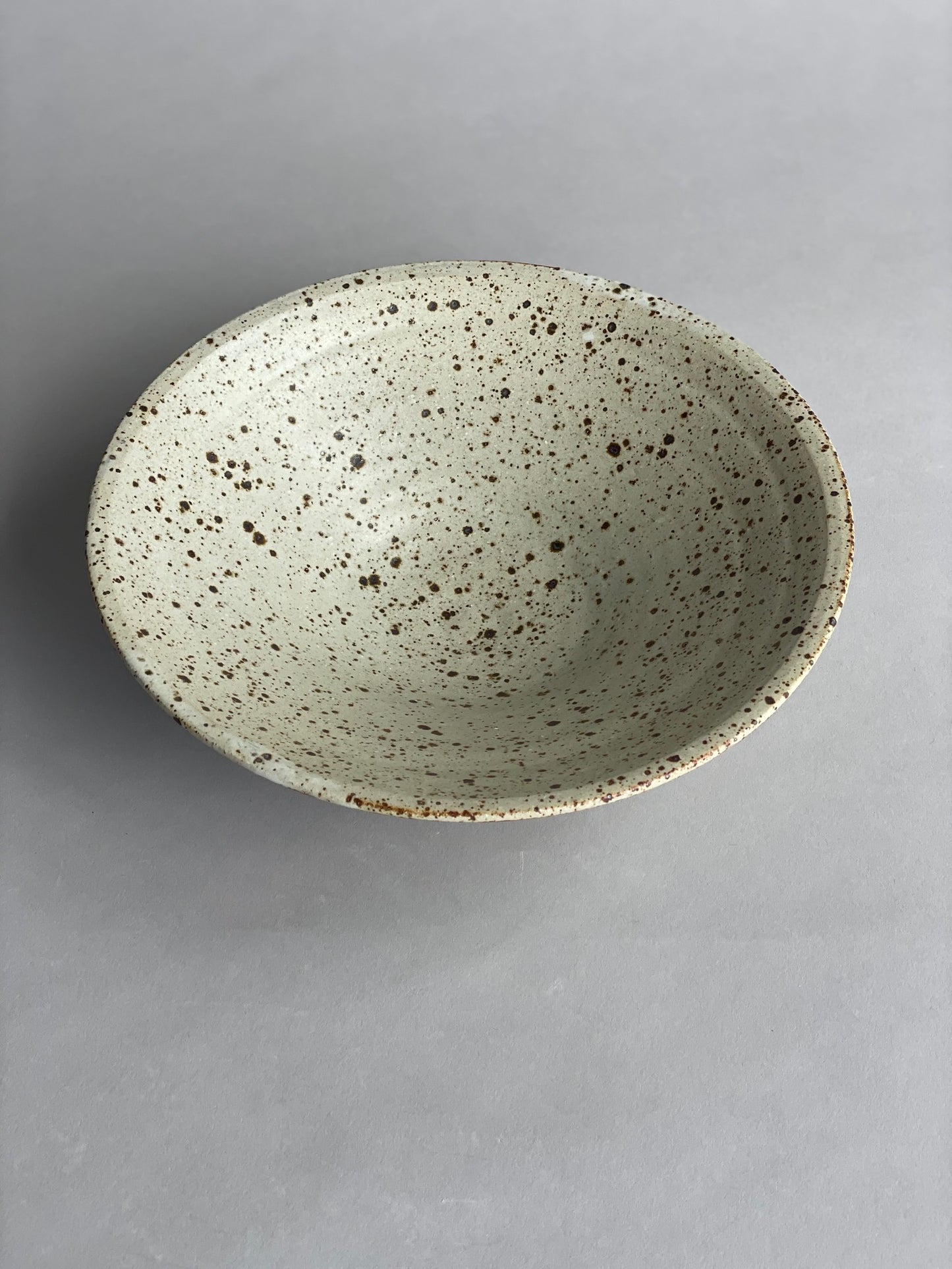 Top view of a ceramic bowl, perfect for serving, display, or as a fruit bowl.