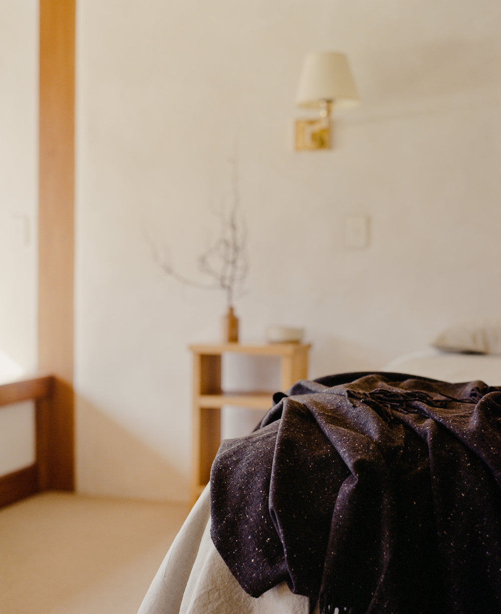Cosy merino wool throw in a deep brown tweed. Made in Ireland exclusively for SITU Studio in limited quantities