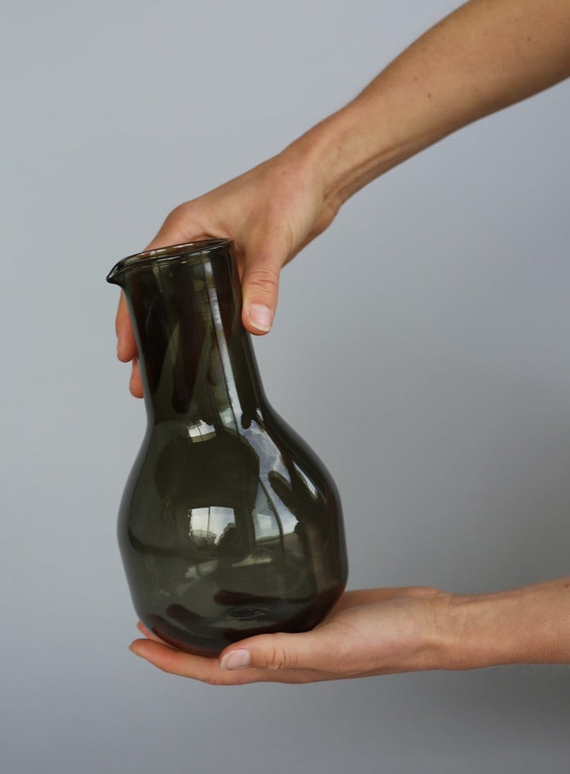 Handmade glass carafe in a lovely deep olive green. Made in collaboration with Monmouth Glass Studio for Situ Studio in small batch production.