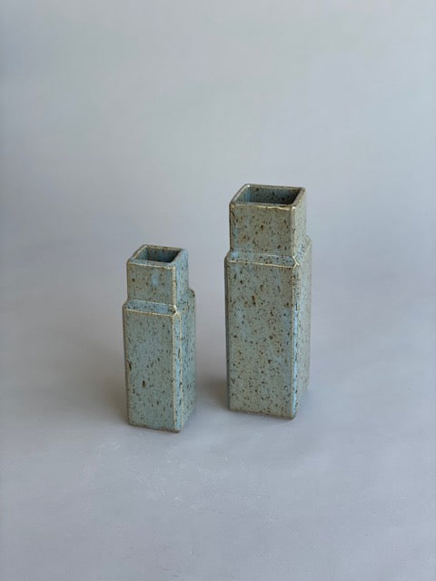 Two column vases by Misma Anaru in an estruscan blue glaze