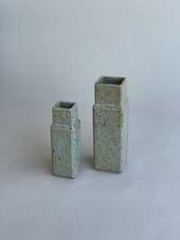 Two column vases by Misma Anaru in an estruscan blue glaze