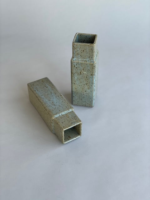 Two column vases by Misma Anaru in an estruscan blue glaze.