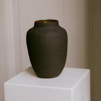 Close-up of a one-of-a-kind ceramic vessel by Tor Harrison, showcasing its organic form.