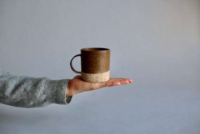 Handmade mug in a deep earthy green glaze with a beautiful textural clay. Exclusive to Situ Studio.