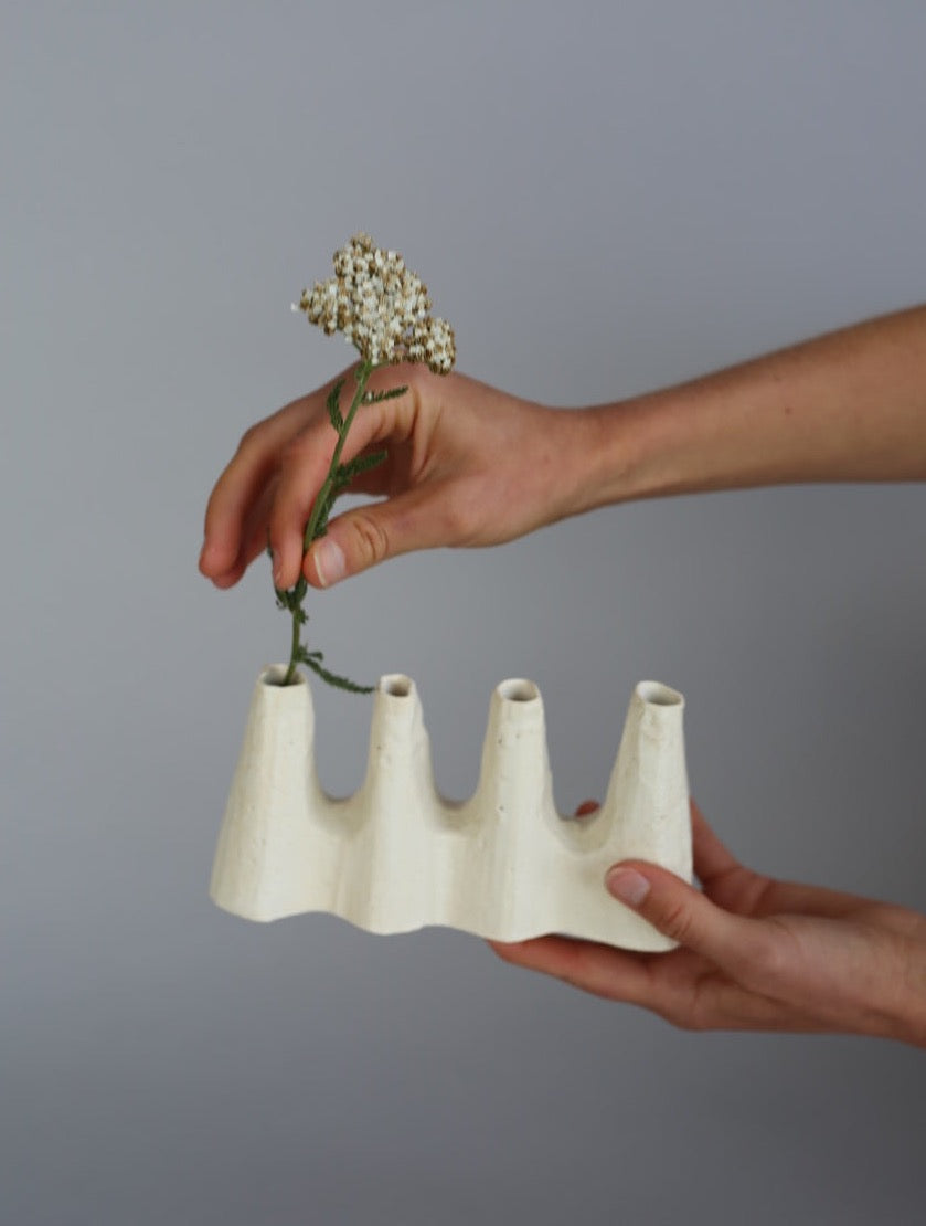 Sculptural white ceramic vase made by artist Kirsten Perry