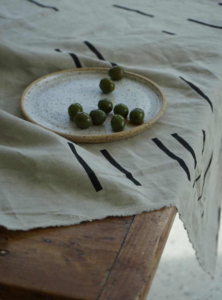 Beautiful heavy linen throws screen printed in a limited edition print by Situ Studio. These also make a special linen table cloth.