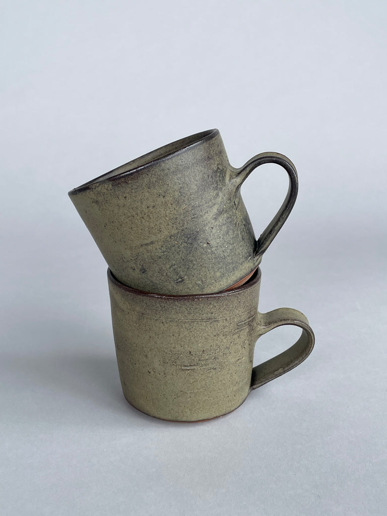 A collaboration between potter Zoe Isaacs featuring unique cups with a special green glaze