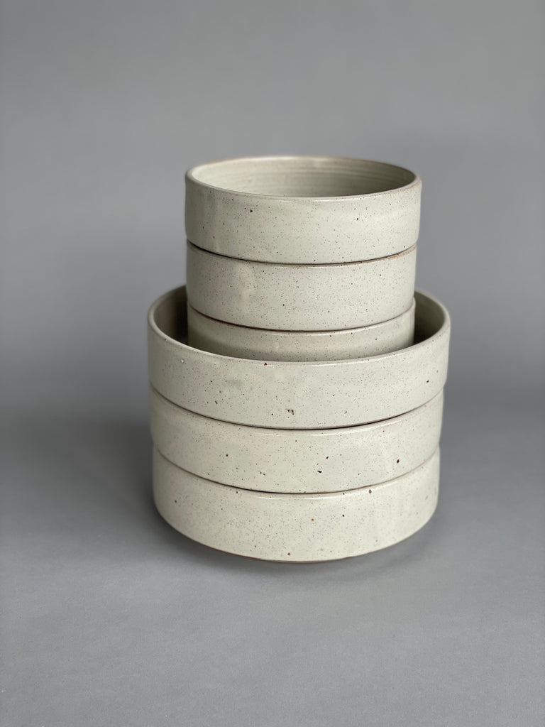 Stacking bowls in a beautiful warm white glaze. Handmade by potter Richard Beauchamp for Situ Studio.