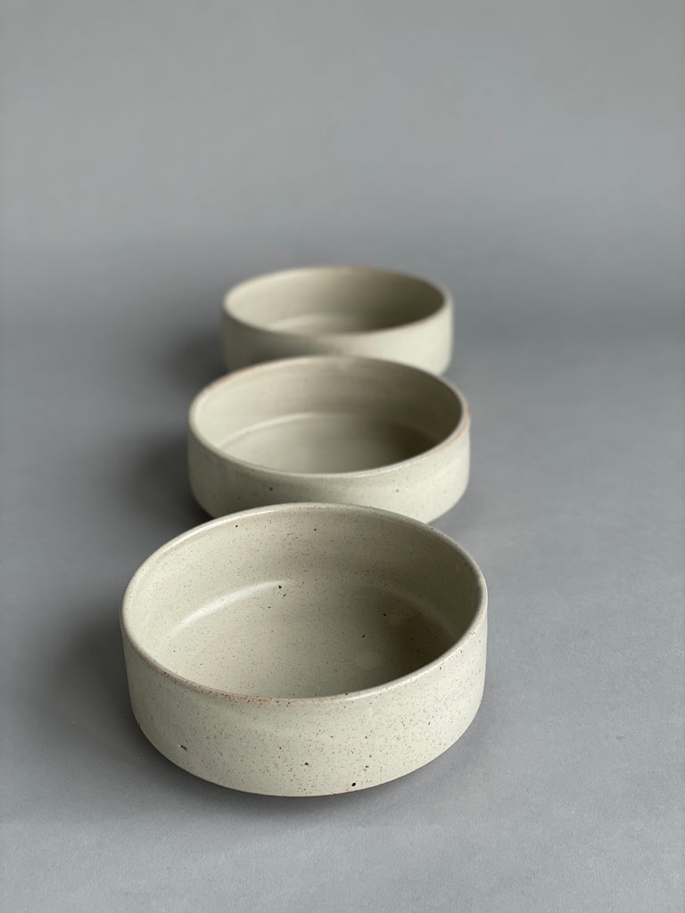 Exclusive warm white glaze on this everyday handmade ceramic bowl, by New Zealand potter Richard Beauchamp. These bowls are ideal for serving, snacks and as a breakfast bowl.