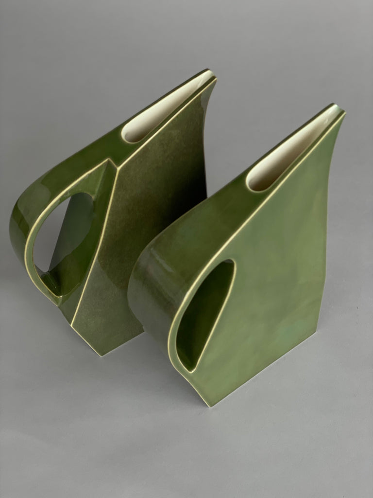 Handmade green ceramic water jug by potter Yuro Cuchor for SITU Studio. A unique modern shape available in three colours, Orange, Leaf Green & Deep Green