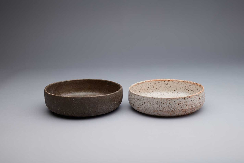 Unique textured bowls handmade by potter Kirsten Dryburgh. A white speckled finish and a earthy green finish both exclusive to Situ Studio.